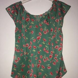 Green and pink floral blouse